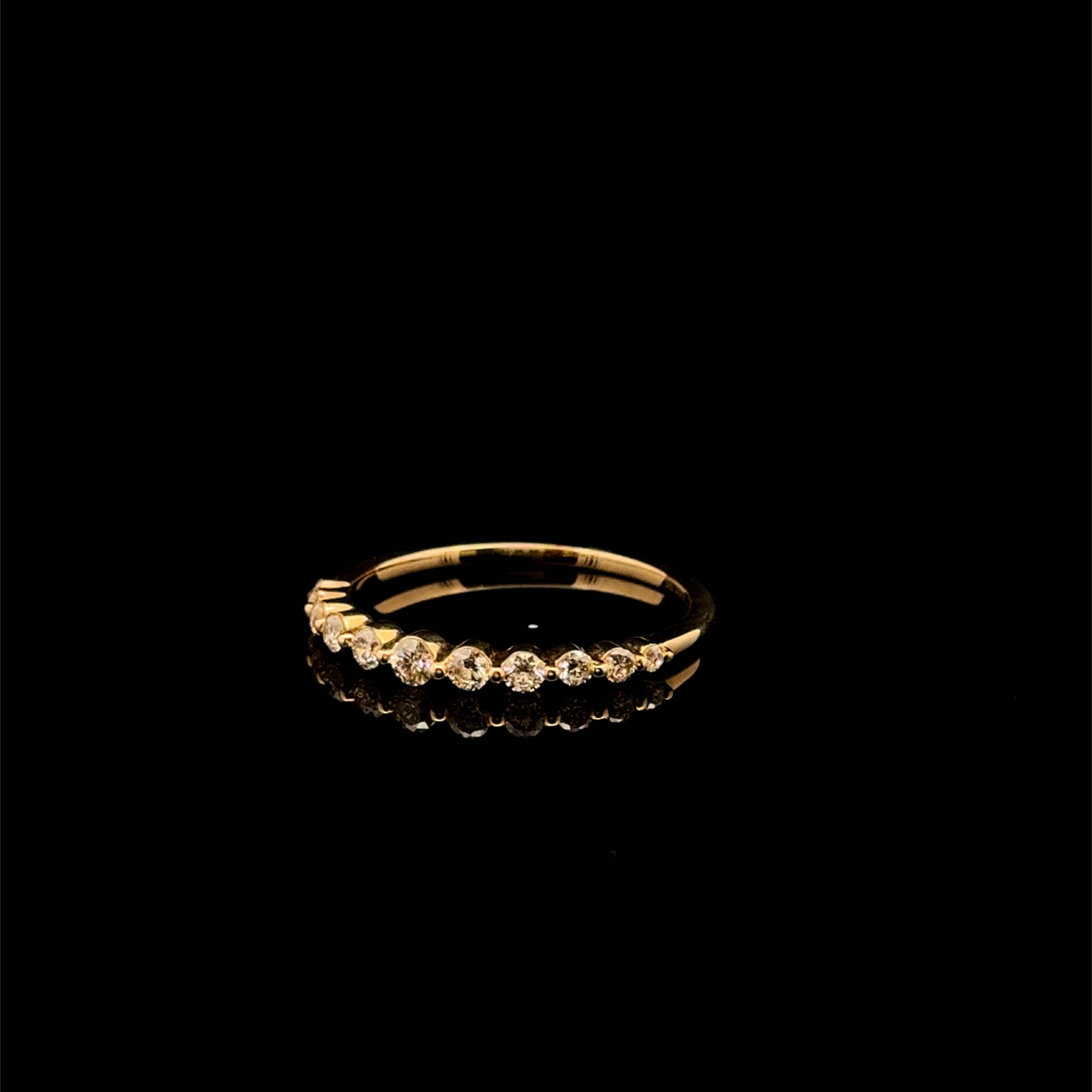 Round Diamond Bezel Graduated Yellow Gold Ring