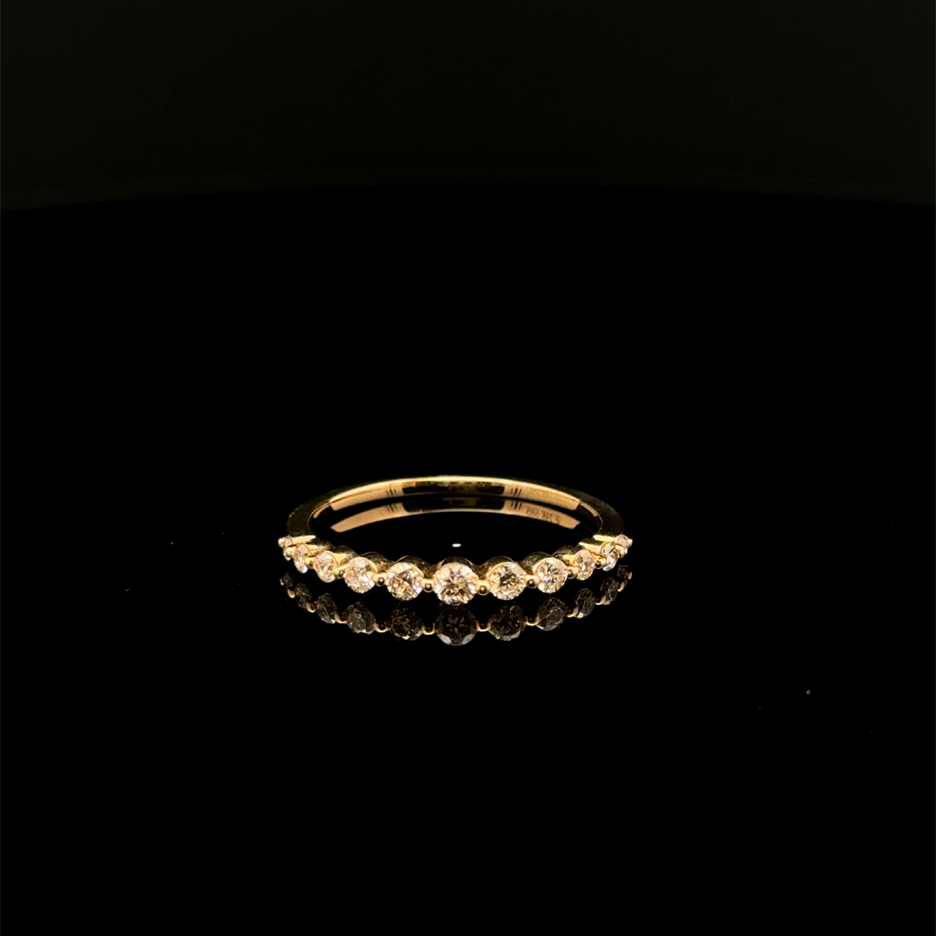 Round Diamond Bezel Graduated Yellow Gold Ring