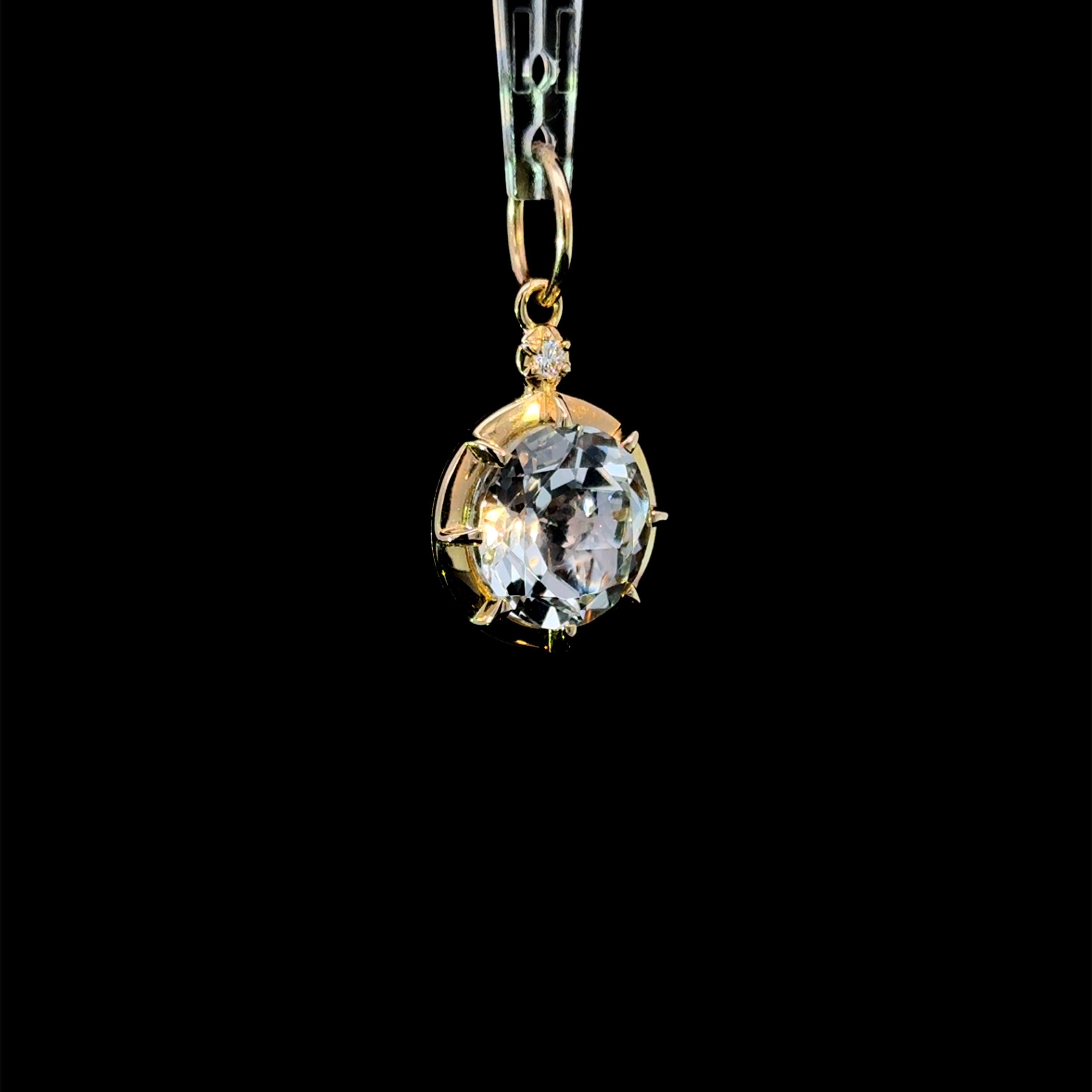 Orbit Topaz Charm